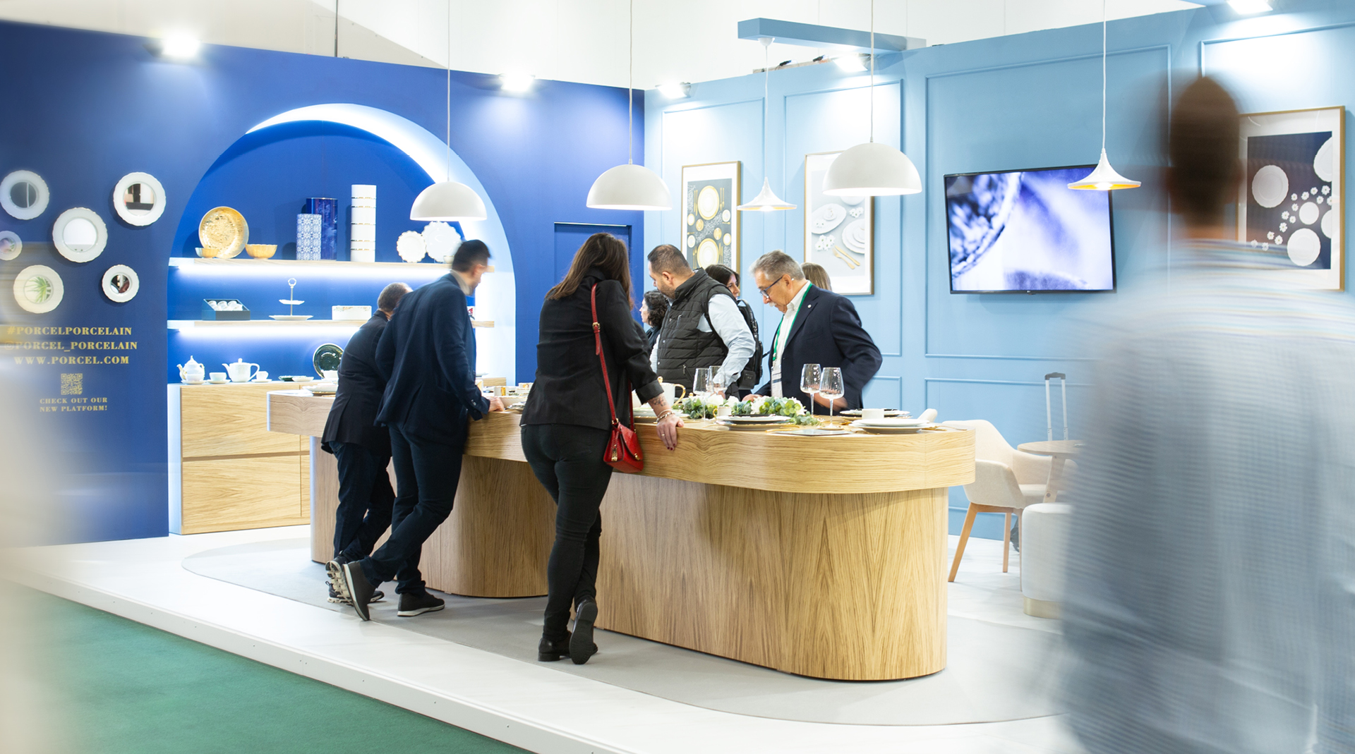 People at a stand at Ambiente